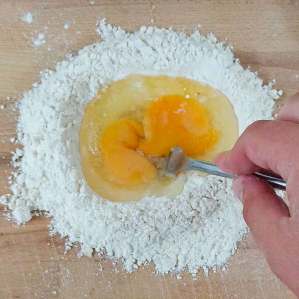 Mixing homemade pasta dough
