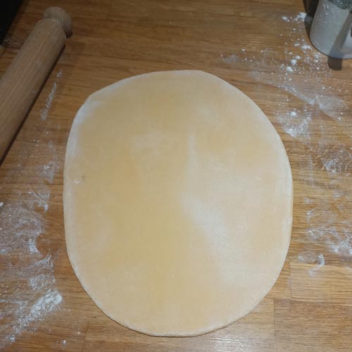 Using rolling pin on pasta dough
