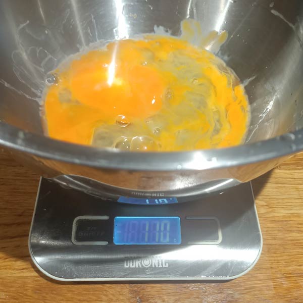 Weighing eggs for homemade fresh pasta