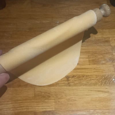 Flipping over pasta dough