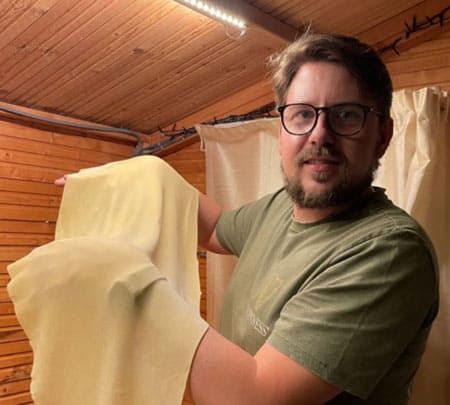 Holding large sheet of pasta