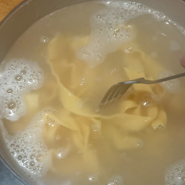 Stirring homemade pasta