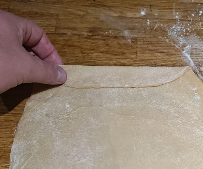 Folding over homemade pasta dough